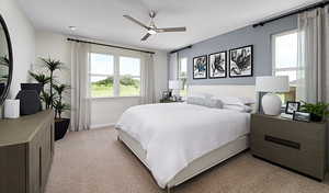 Bedroom with light carpet and ceiling fan