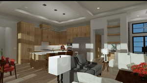 Kitchen featuring built in appliances, light wood-type flooring, a kitchen island with sink, and a tray ceiling