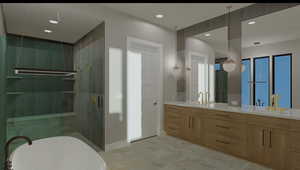 Bathroom featuring vanity and shower with separate bathtub