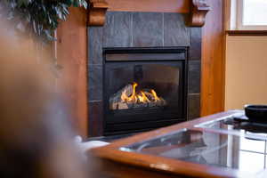 Details with a tile fireplace