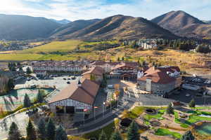 Birds eye view of property with a mountain view