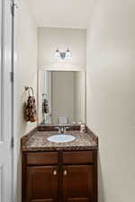 Bathroom with vanity and toilet