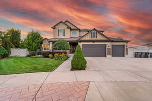 Craftsman-style home featuring a lawn