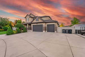 Craftsman-style home featuring a garage