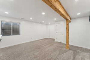 Basement with carpet