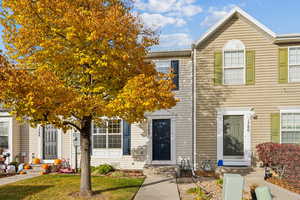 Multi unit property featuring a front yard