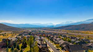 Birds eye view of property with a mountain view