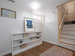 Staircase with wood-type flooring