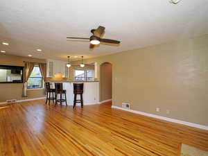 good size living and dining room with original hardwood floors.