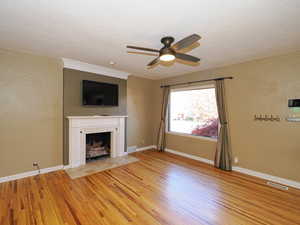 Fireplace. Large windows that allow for good natural light throughout the home.