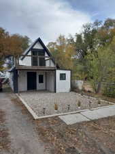 View of front facade with a deck