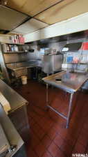 Kitchen featuring dark tile patterned flooring