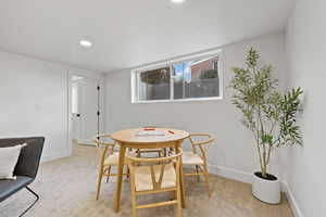 View of carpeted dining space