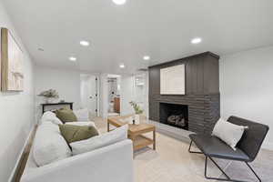 Living room with a brick fireplace