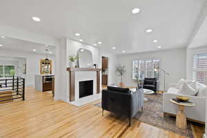 Living room featuring a wealth of natural light and light hardwood / wood-style floors