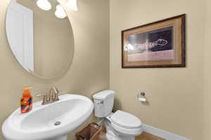 Bathroom featuring toilet and sink