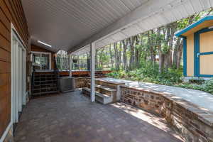 View of patio featuring covered porch and central AC unit