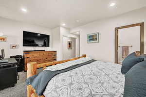 Primary bedroom with walk-out to lower patio.