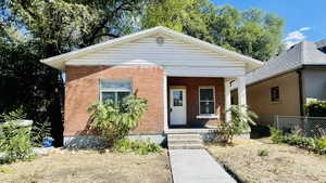 Bungalow-style house featuring covered porch