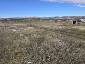 View of mountain feature with a rural view