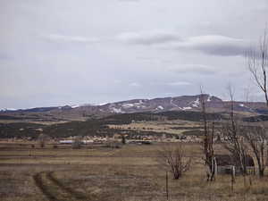 Property view of mountains featuring a rural view