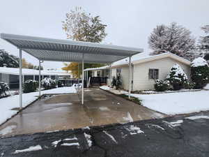 View of snow covered parking area