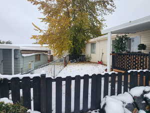 View of yard covered in snow