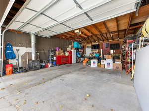 Garage featuring a garage door opener