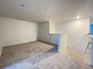 Basement featuring carpet floors