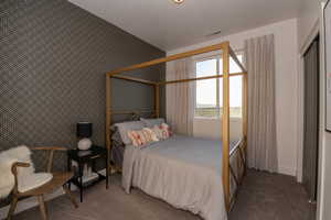 Bedroom featuring carpet floors