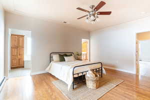 Spacious master bedroom with dual access to bathroom amenities