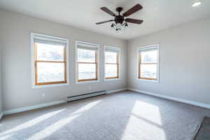 Sunroom off living room with fireplace to warm those toes in the winter