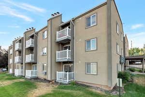 View of property featuring cooling unit