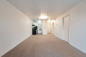 Interior space featuring a textured ceiling