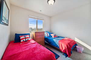 View of carpeted bedroom