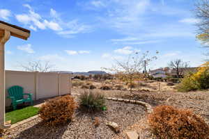 View of yard with a mountain view