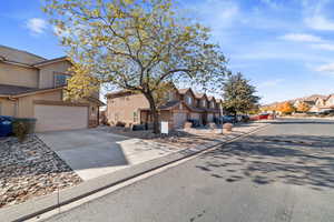 View of property featuring a garage