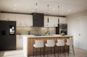 Kitchen featuring white cabinets, light wood-type flooring, black refrigerator with ice dispenser, and a kitchen island with sink