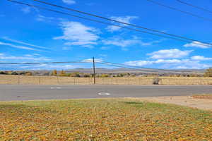 View of street featuring a mountain view and a rural view