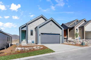 View of front of property with a garage