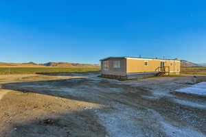 Exterior space with a mountain view and a rural view