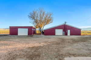 View of outbuilding featuring a mountain view