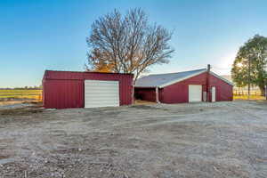 View of outdoor structure featuring a garage