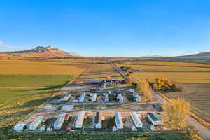 Drone / aerial view with a mountain view and a rural view