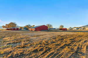 View of yard with a rural view