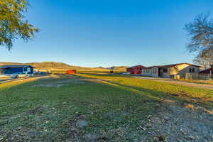 View of yard featuring a mountain view