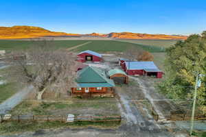 Drone / aerial view featuring a mountain view and a rural view