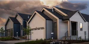 View of front facade featuring a garage