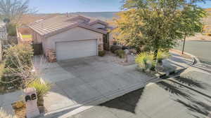 View of front of home featuring a garage