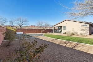 View of yard with a patio